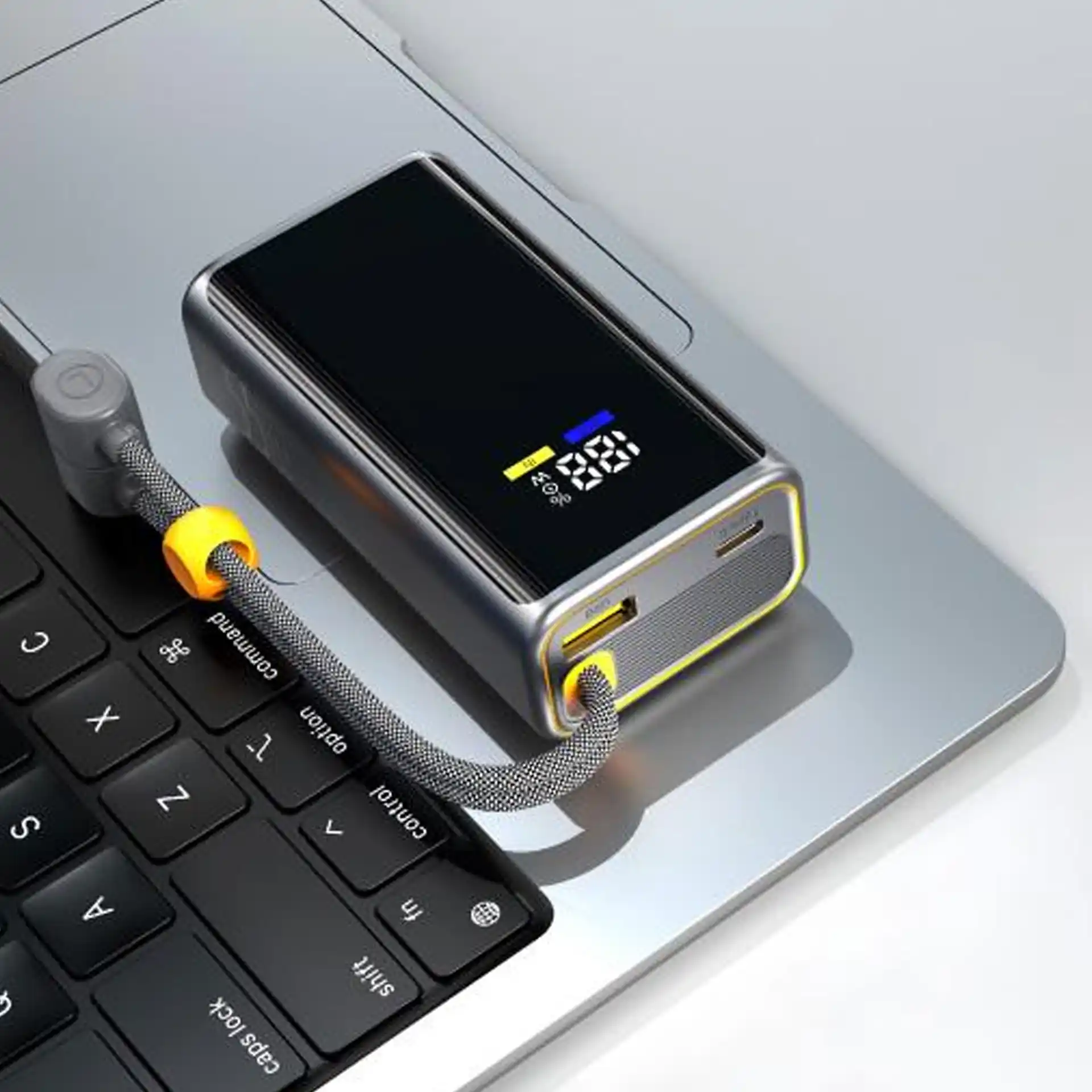 WOP09 55W Semi-Solid-State Power Bank 10000mAh with dual built-in fast charging cables, Type-C and Lightning, next-gen battery technology